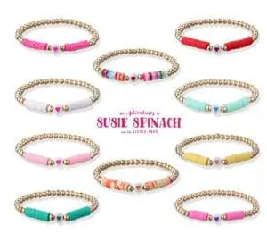 A bunch of bracelets that are all different colors