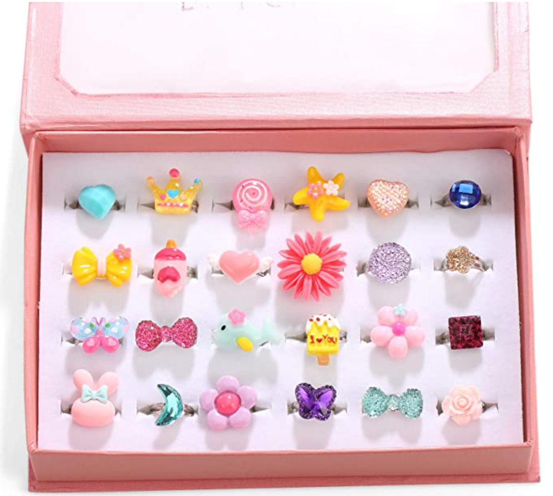 A box of rings with different designs on them